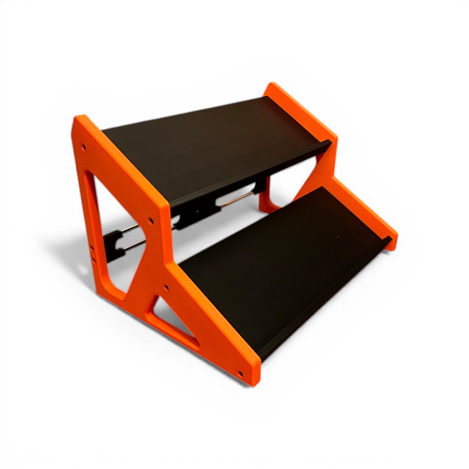3D printed Guitar Pedal Desktop Stand 2 Tier 400mm width x 150mm hold depth per tier, 30 Degree Pedalboard & Synth Stand stand by Cold Earth Industries, shown in black with orange sides on a white background – custom desktop stands.