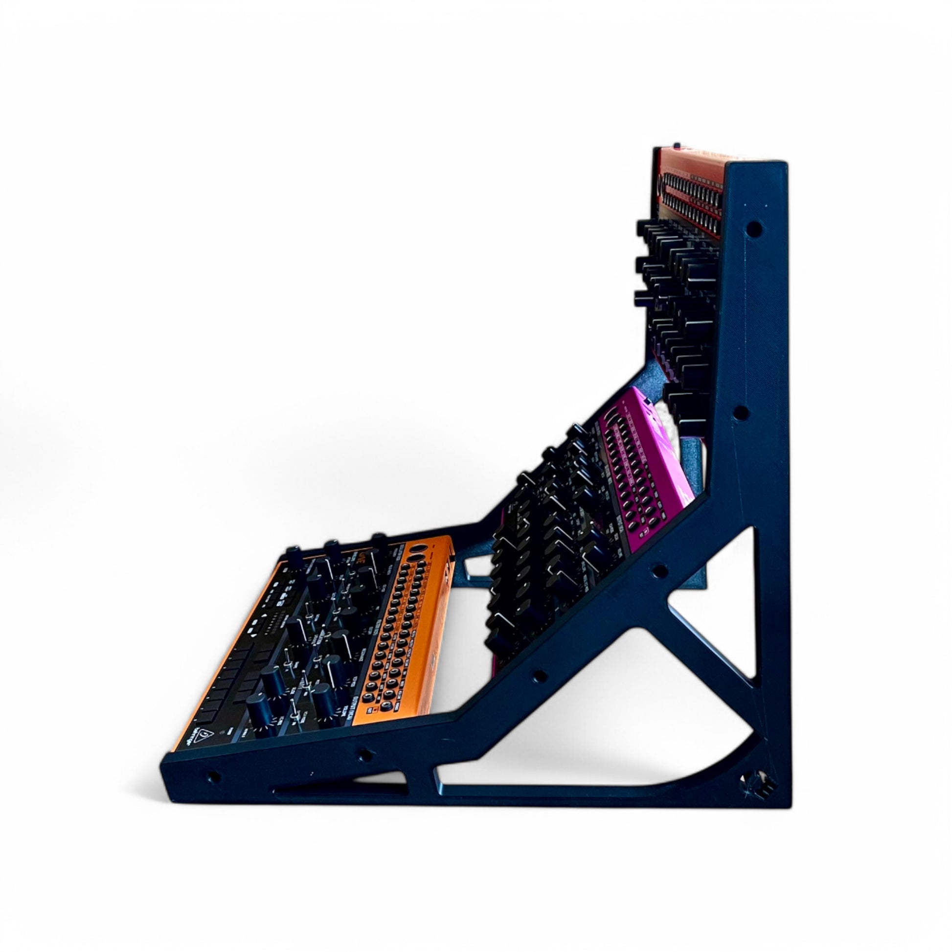 3D printed Behringer Crave / Edge / Spice / Grind 3 Tier Side Panels Synth stand by Cold Earth Industries, shown reverse  side view in black on a white background holding Behringer Crave, behringer Edge, Behringer Spice – custom desktop stands.