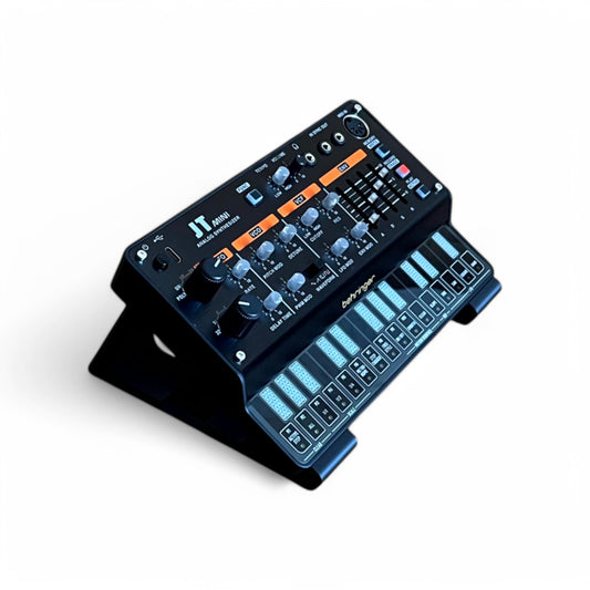 3D printed Behringer Pro VS Mini JT PHARA-O Synth 30 degree stand by Cold Earth Industries, shown in black on a white background with JT Mini (not included) – custom desktop stands.
