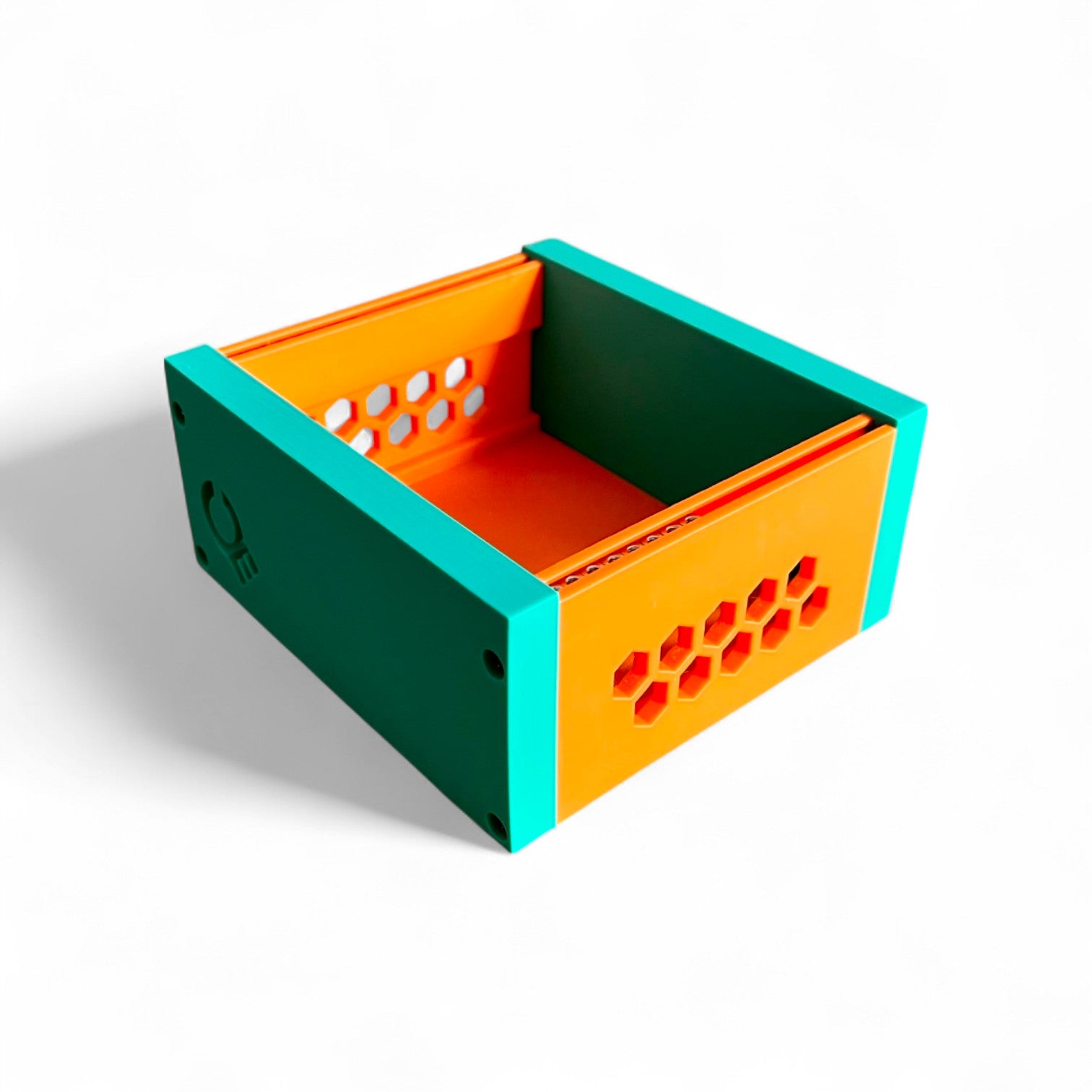 3D printed 20HP 3U Eurorack modular synthesizer case by Cold Earth Industries, shown with orange body and Green side panels on a white background – custom desktop skiff enclosure.