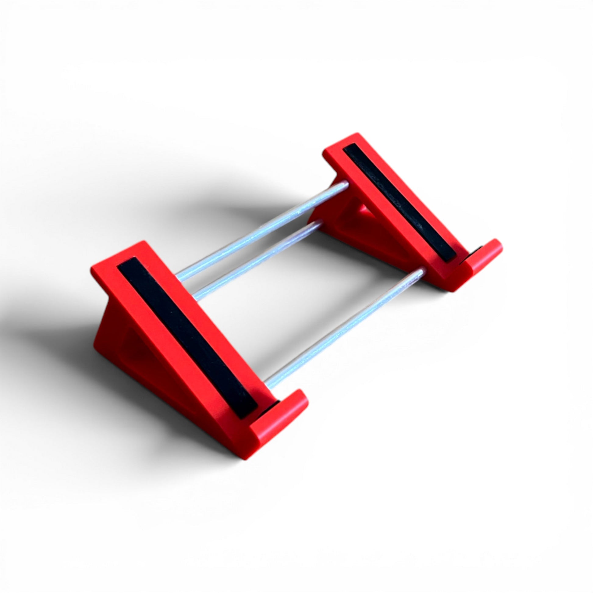 3D printed Darkglass Electronics Anagram Bass Multi-Effects Unit Guitar Pedal 30 Degree stand by Cold Earth Industries, shown in red on a white background – custom desktop stands.