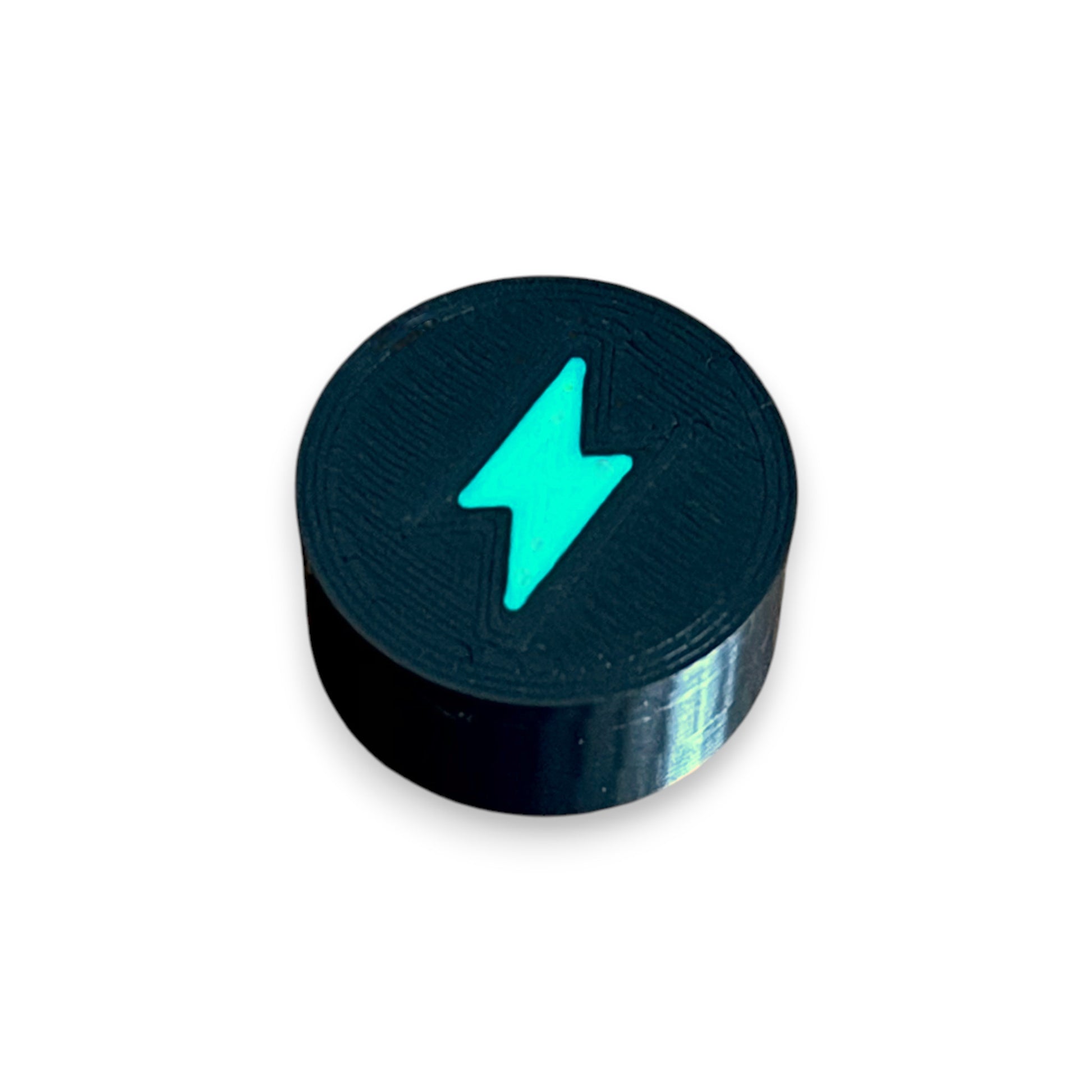 Electric Mistres Guitar Pedal Footswitch Topper for 8.5mm / 10mm / 11mm Foot Switch. 3D printed Electric Design by Cold Earth Industries, shown in black with a green bolt icon, on a white background.