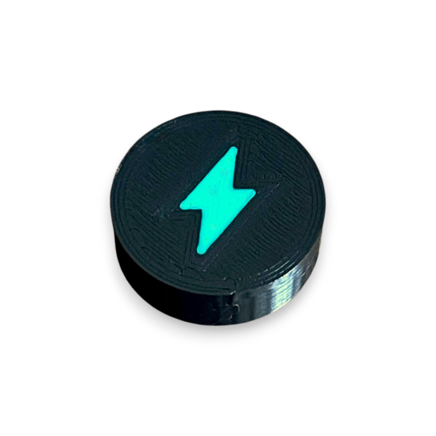 Low Profile Electric Mistress Guitar Pedal Footswitch Topper for 8.5mm / 10mm / 11mm Foot Switch. 3D printed Electric Design by Cold Earth Industries, shown in black with a green bolt icon, on a white background.