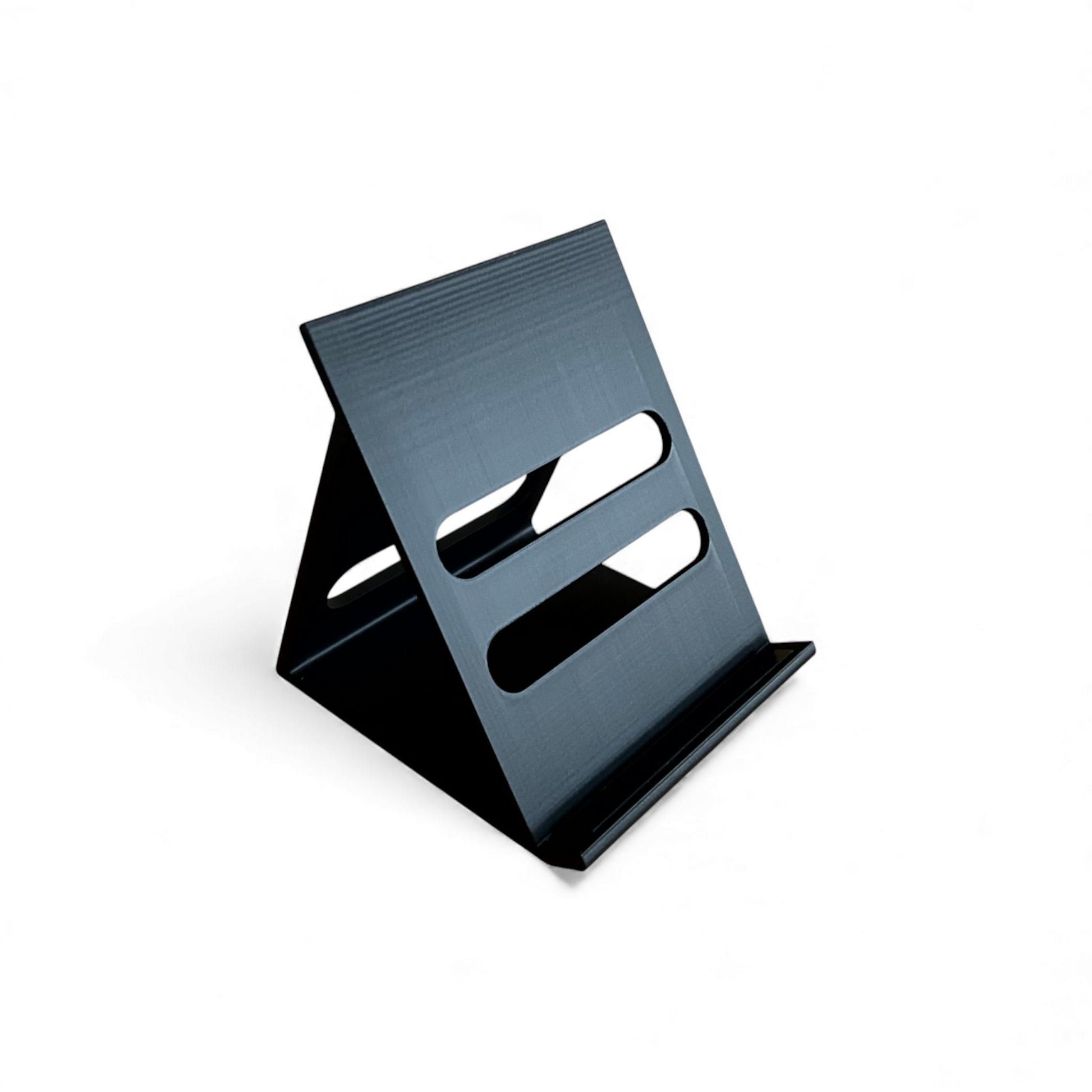 3D printed ElectroHarmonix Big Muff Pi Guitar Pedal 60 Degree stand by Cold Earth Industries, shown in black on a white background – custom desktop stands.