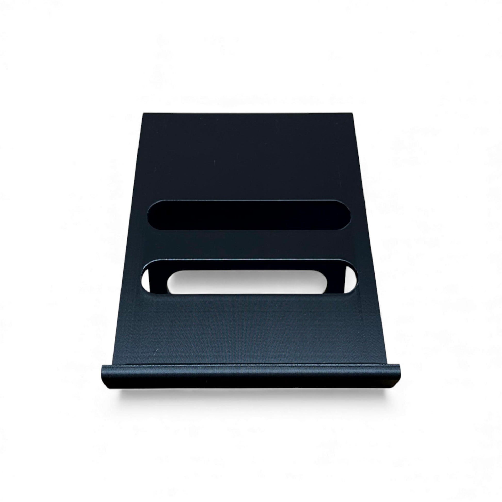 3D printed ElectroHarmonix Big Muff Pi Guitar Pedal 60 Degree stand by Cold Earth Industries, shown front view,  in black on a white background