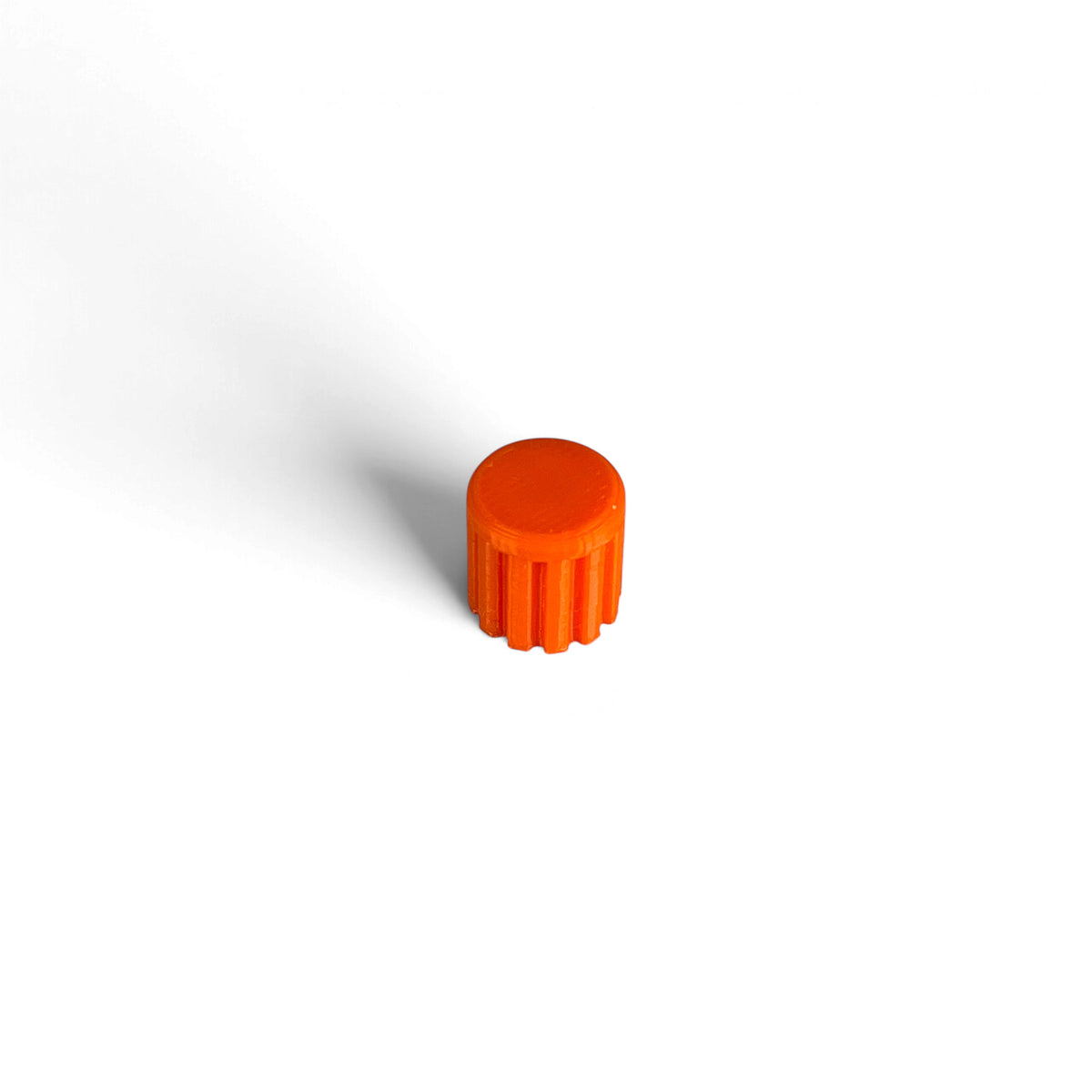 Single M-Vave FM-1 encoder cap in orange, 3D printed by Cold Earth Industries