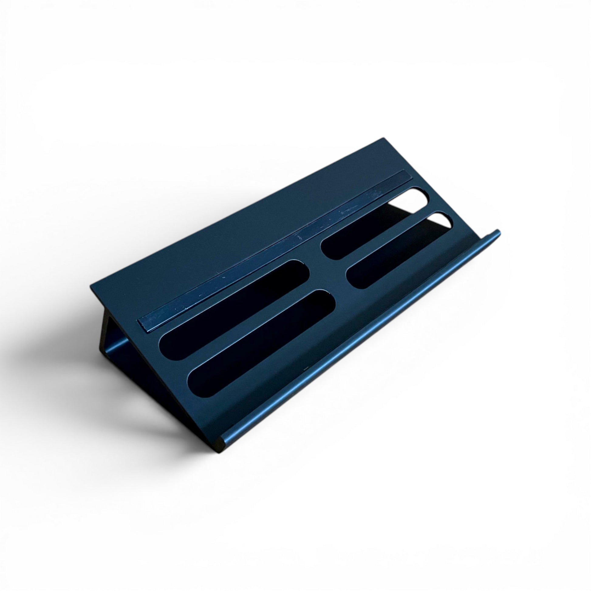 3D printed Cold Earth Industries Guitar Pedal Desktop Stand LITE 300MM Guitar Pedal 30 Degree stand by Cold Earth Industries, shown in black on a white background – custom desktop stands.