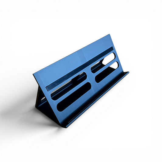 3D printed Cold Earth Industries Guitar Pedal Desktop Stand LITE 300MM Guitar Pedal 60 Degree stand by Cold Earth Industries, shown in black on a white background – custom desktop stands.