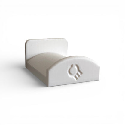 3D printed  Headphone Holder for IKEA SKADIS UPPSPEL Headphones by Cold Earth Industries, shown in White, on a white background – custom studio and live performance gear.