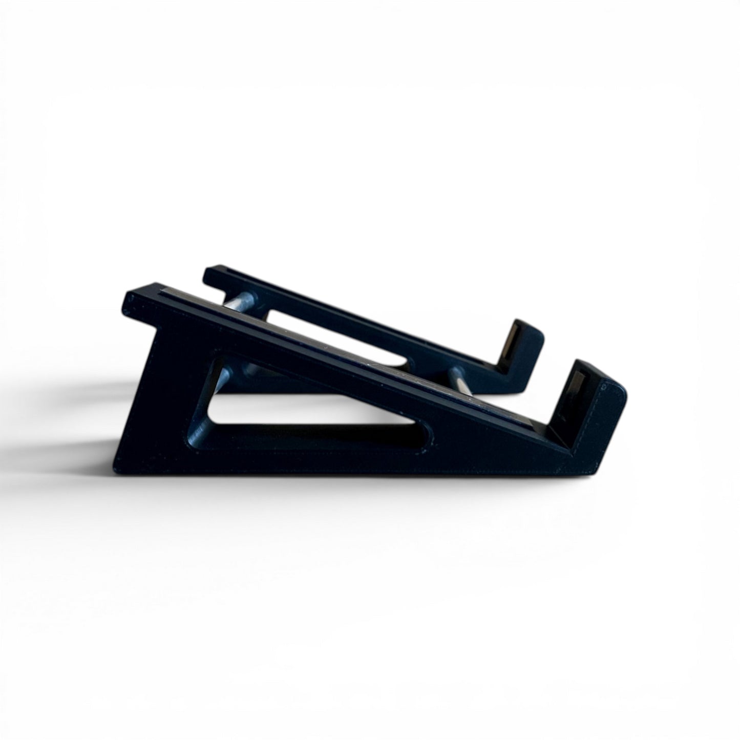 3D printed Hologram Electronics Microcosm Guitar Pedal 20 Degree stand by Cold Earth Industries, shown side view, in black, on a white background