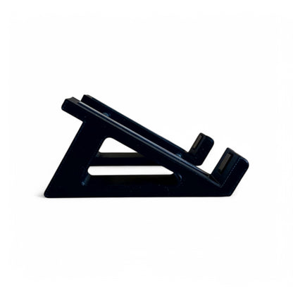 3D printed Neural DSP Nano Cortex Guitar Pedal 30 Degree stand by Cold Earth Industries, shown side view, in black, on a white background – custom desktop stands.