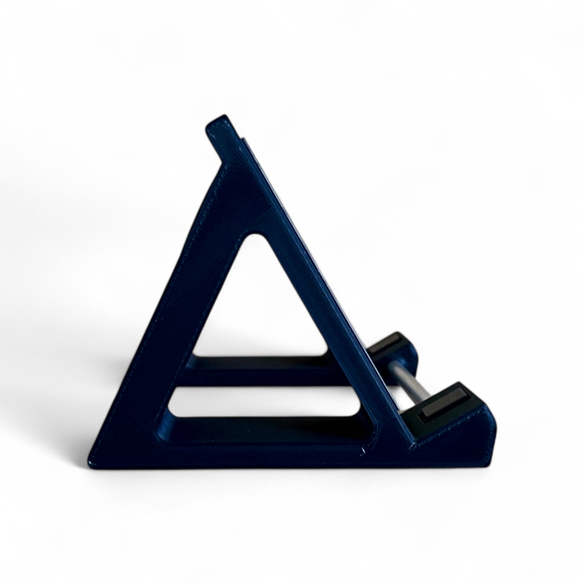 3D printed Empress Reverb / Echosystem Guitar Pedal 60 Degree stand by Cold Earth Industries, shown side view in black on a white background – custom desktop stands.