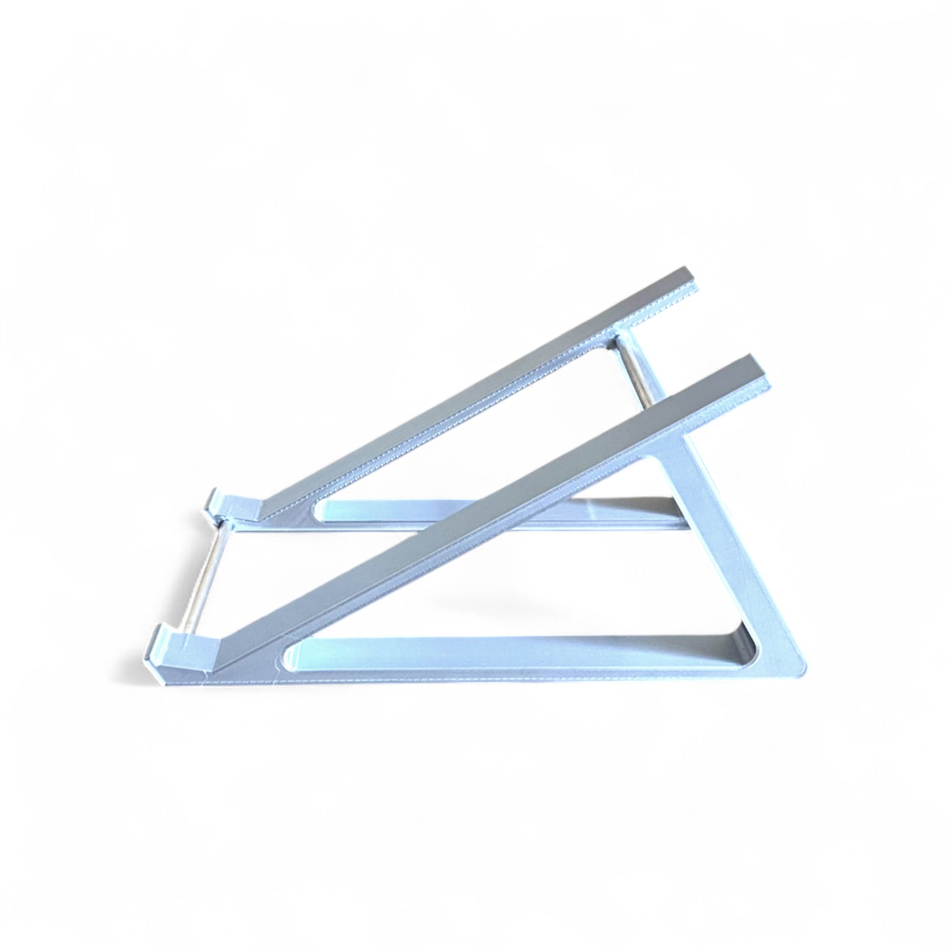3D printed Korg Monologue Synth 30 degree stand by Cold Earth Industries, shown side view in white on a white background