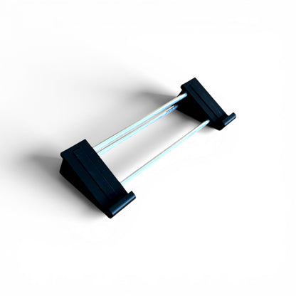3D printed Light Reft Monolit / Concrete Eurorack Case 30 degree stand by Cold Earth Industries, shown in black on a white background