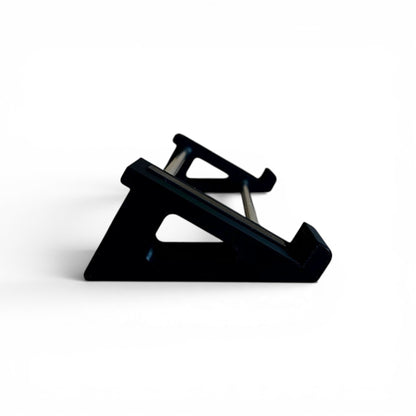 3D printed Light Reft Monolit / Concrete Eurorack Case 30 degree stand by Cold Earth Industries, shown side view, in black, on a white background