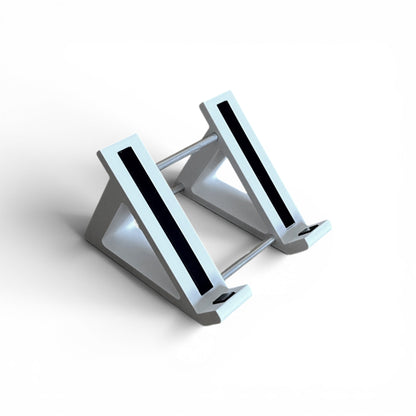 A 3D printed 45 degree white guitar pedal stand with rubber strips and recessed rubber feet, designed for the Line 6 HX Stomp Amp and Effects Processor.