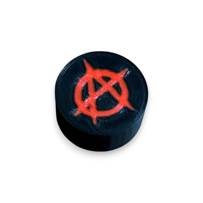 Guitar Pedal Footswitch Topper for 8.5mm / 10mm / 11mm Foot Switch. 3D printed Red Anarchy Design by Cold Earth Industries, shown on a guitar pedal, on a white background.