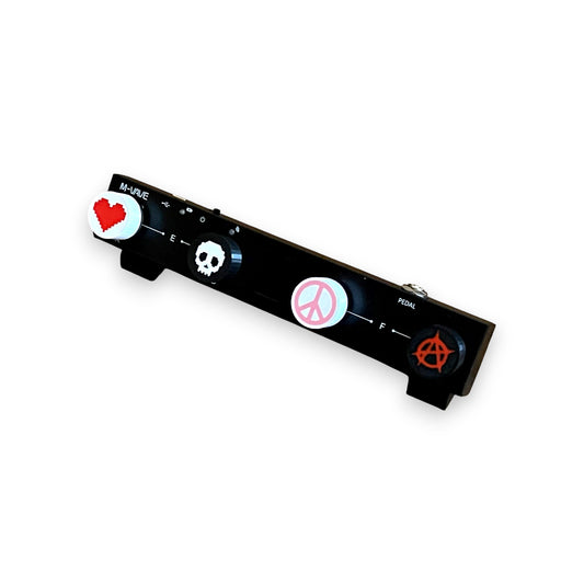 Guitar Pedal Footswitch Topper for 8.5mm / 10mm / 11mm Foot Switch. 3D printed Mixed Set - Heart, Peace, Skull, Anarchy Design by Cold Earth Industries, shown on a guitar pedal, on a white background.