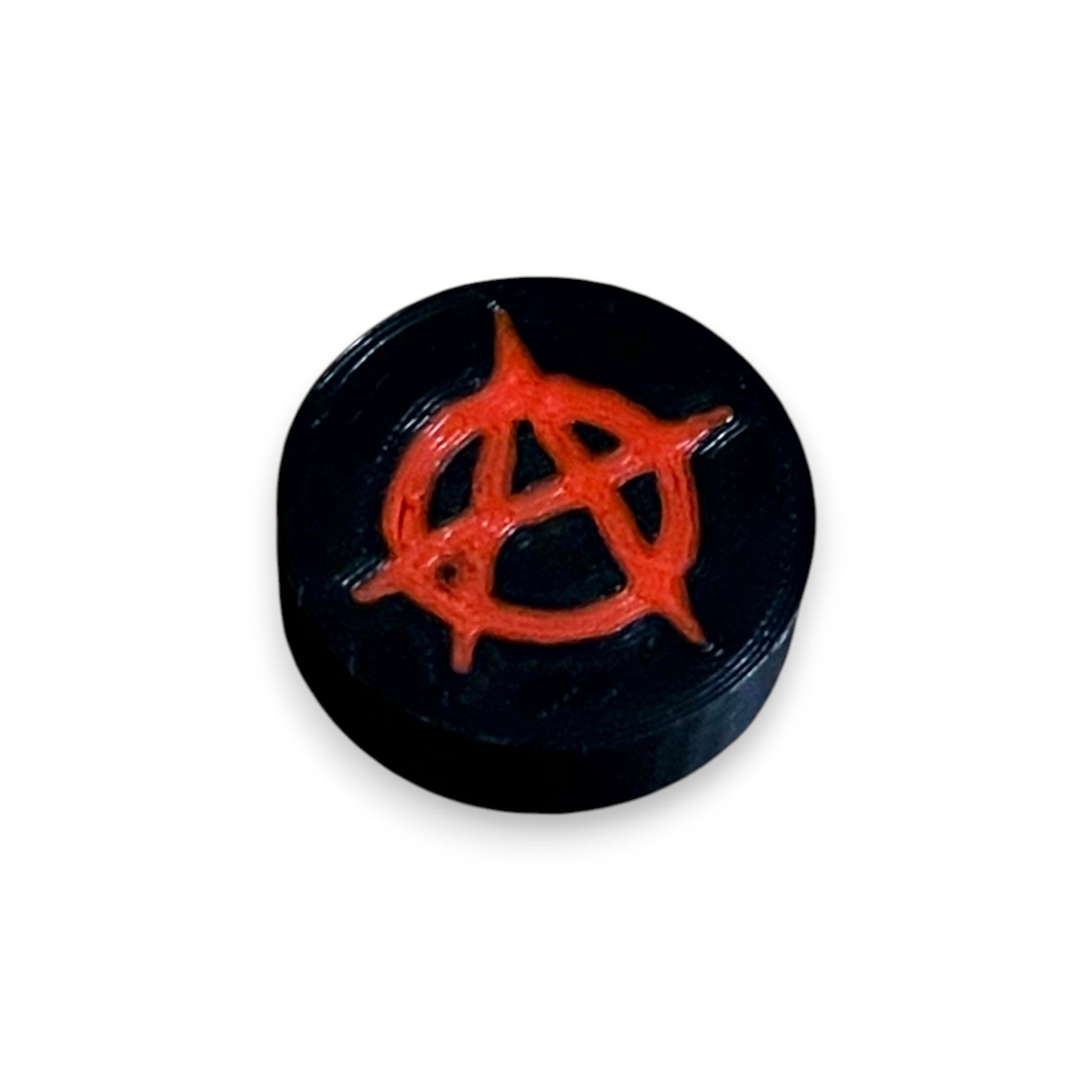 Low Profile Guitar Pedal Footswitch Topper for 8.5mm / 10mm / 11mm Foot Switch. 3D printed Red Anarchy Design by Cold Earth Industries, shown on a guitar pedal, on a white background.