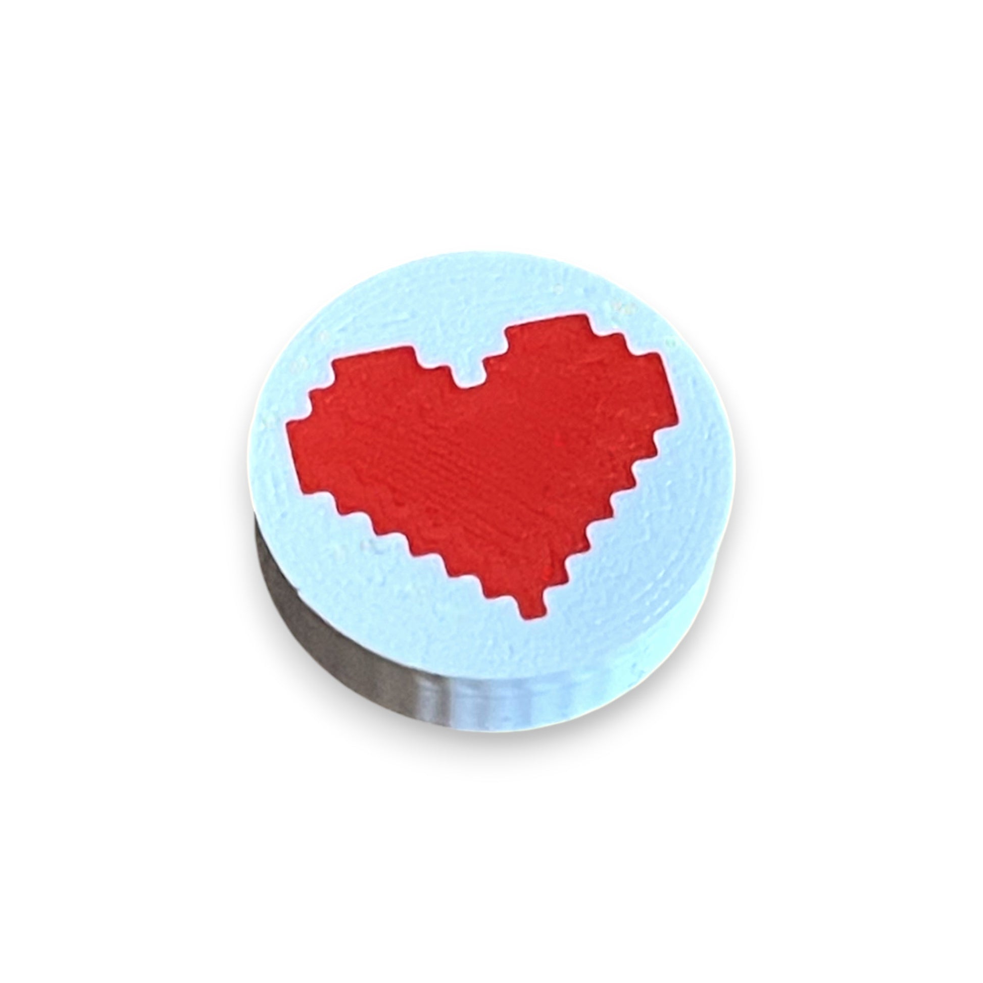 Low Profile Guitar Pedal Footswitch Topper for 8.5mm / 10mm / 11mm Foot Switch. 3D printed Red Heart Design by Cold Earth Industries, shown on a guitar pedal, on a white background.