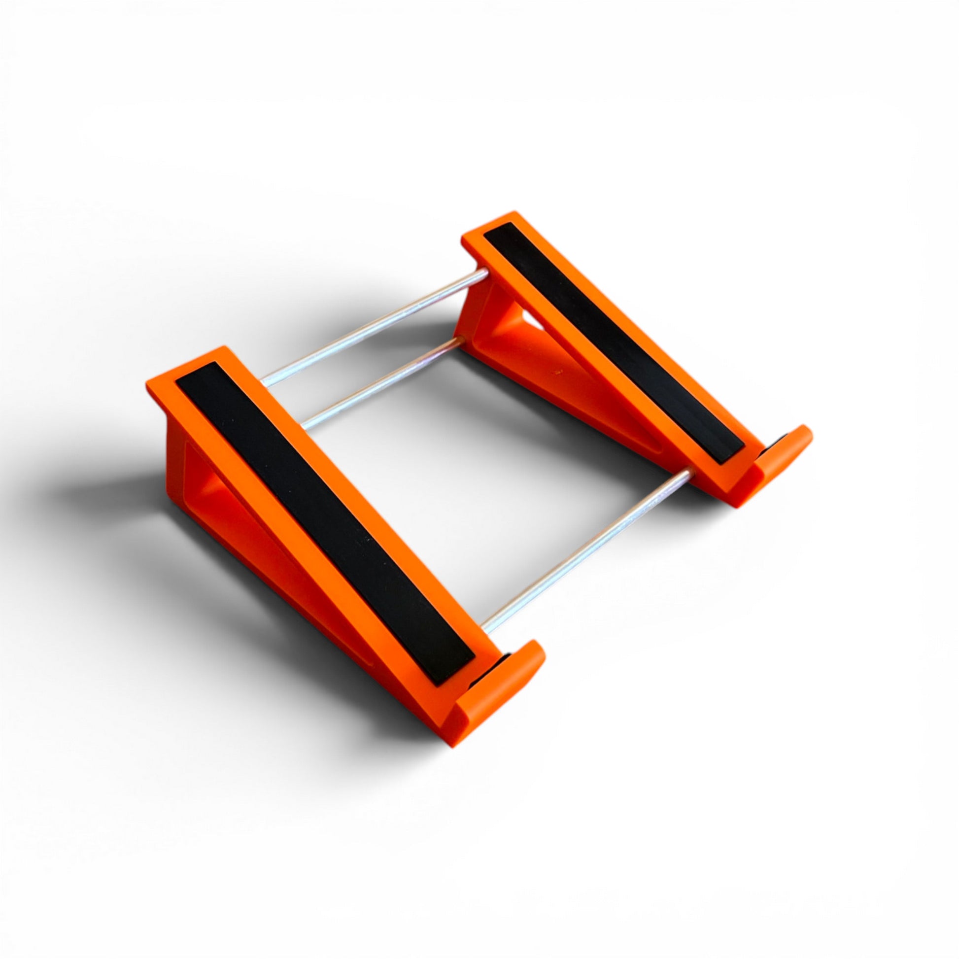 3D printed Neural DSP Quad Cortex Guitar Pedal 20 degree stand by Cold Earth Industries, side view, shown in orange on a white background – custom desktop stands.