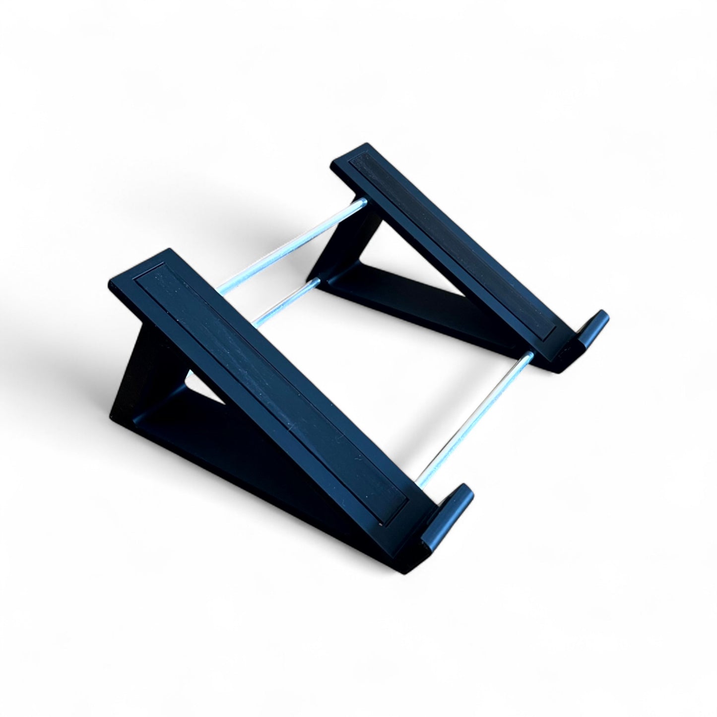 3D printed Neural DSP Quad Cortex Guitar Pedal 30 degree stand by Cold Earth Industries, shown in black on a white background – custom desktop stands.