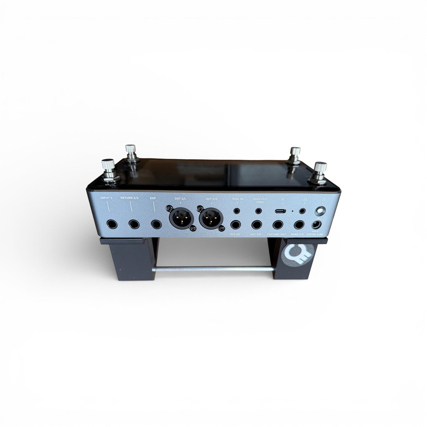 3D printed Neural DSP Quad Cortex Mini Guitar Pedal 30 Degree stand by Cold Earth Industries, shown back view with Quad Cortex Mini, in black on a white background – custom desktop stands.