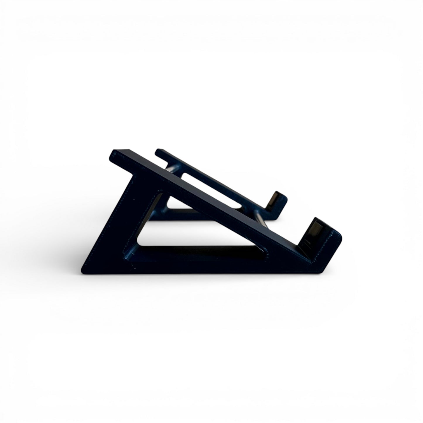 3D printed Neural DSP Quad Cortex Mini Guitar Pedal 30 Degree stand by Cold Earth Industries, shown side view, in black on a white background – custom desktop stands.