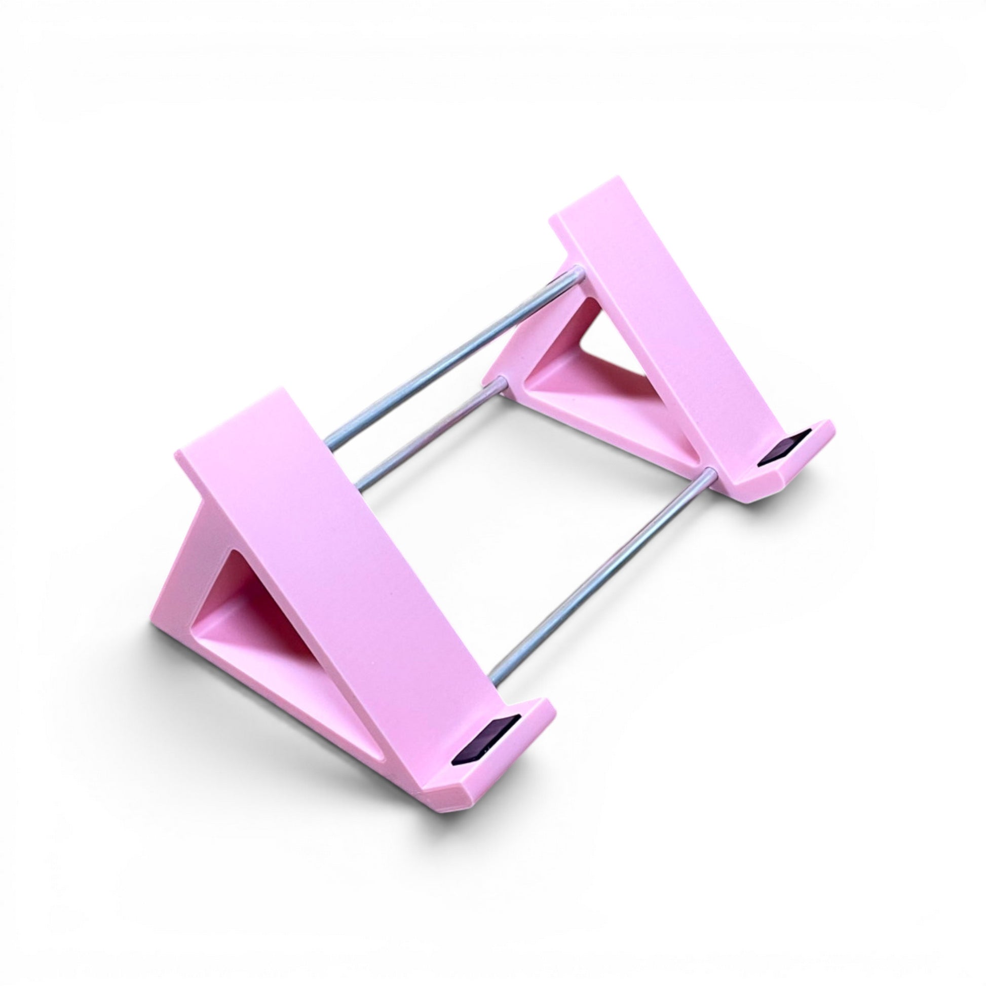 3D printed Neural DSP Quad Cortex Mini Guitar Pedal 45 Degree stand by Cold Earth Industries, shown in pinkon a white background – custom desktop stands.