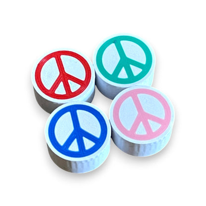 Set of 4 Peace Sign Guitar Pedal Footswitch Toppers for 8.5mm / 10mm / 11mm Foot Switch. 3D printed Peace Design by Cold Earth Industries, shown on a white background.