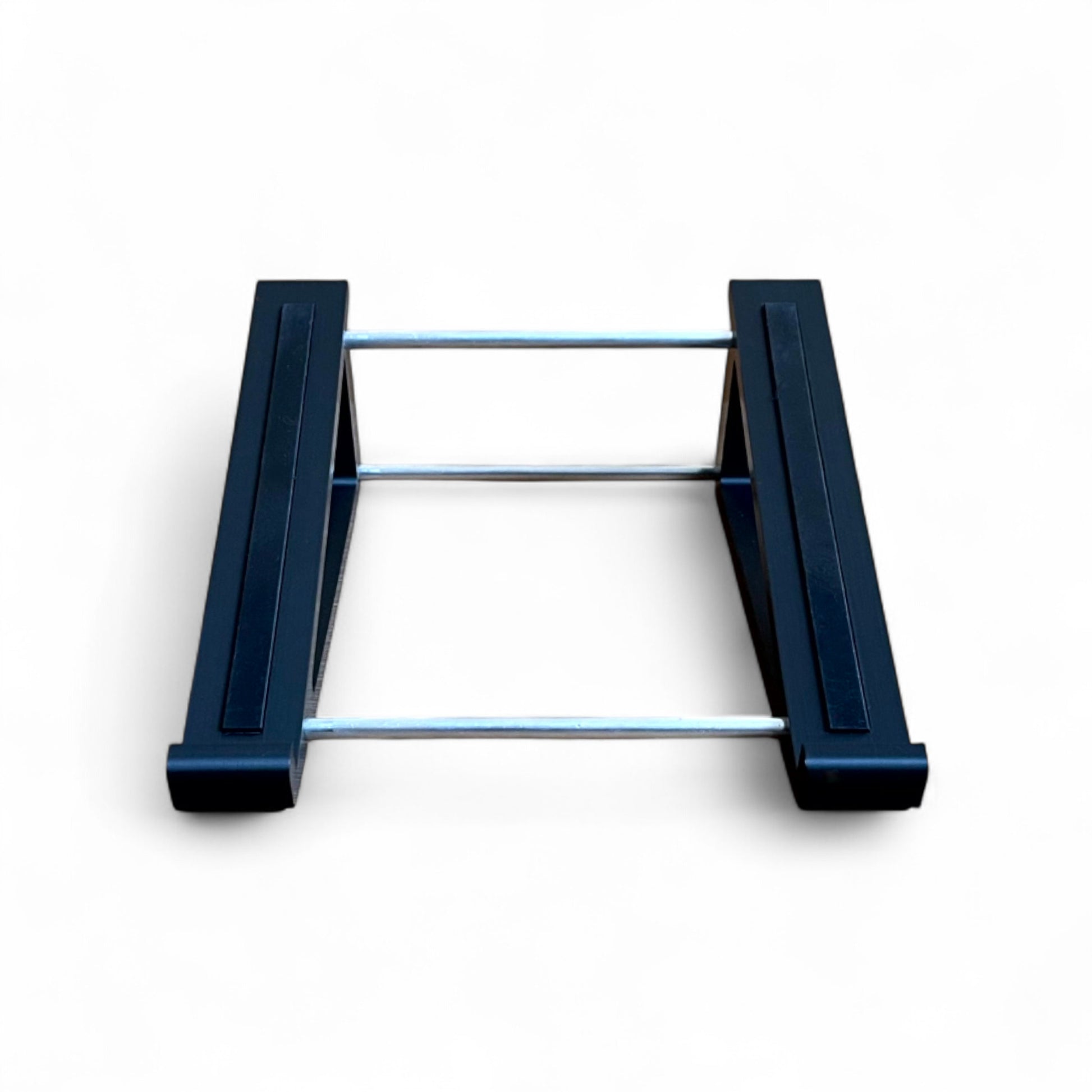 3D printed Presonus Atom Midi Controller 20 degree stand with rubber strips by Cold Earth Industries, shown front view in black on a white background