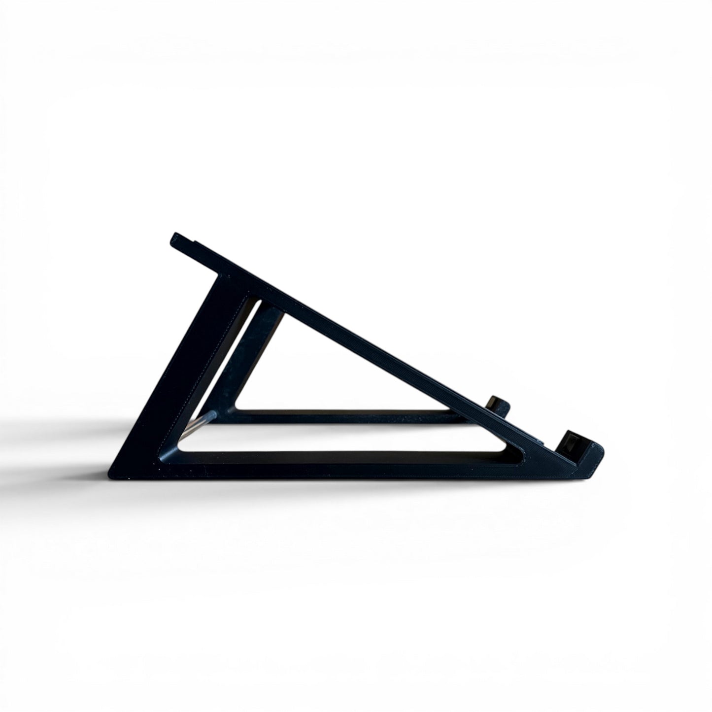 3D printed Presonus Atom Midi Controller 30 degree stand with rubber strips by Cold Earth Industries, shown side view in black on a white background
