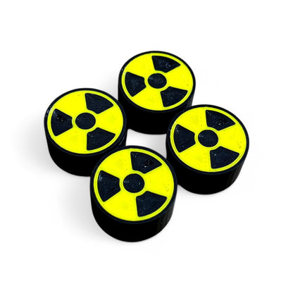 3D printed Radiation Sign Guitar Pedal Footswitch Toppers 4 Pack by Cold Earth Industries, shown with a black and yellow Radiation Sign on a white background – custom
