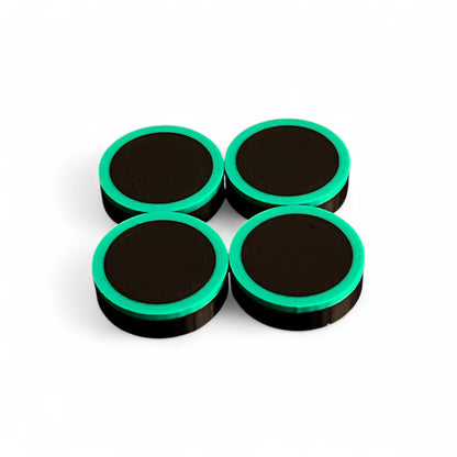 Set of 4 Guitar Pedal Footswitch Topper Low Profile for 11MM Foot Switch. 3D printed Black Base and Green Ring Design by Cold Earth Industries, shown on a white background.