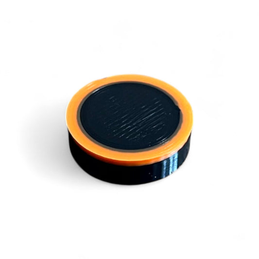 Guitar Pedal Footswitch Topper Low Profile for 8.5MM Foot Switch. 3D printed Black Base and Orange Ring Design by Cold Earth Industries, shown on a white background.