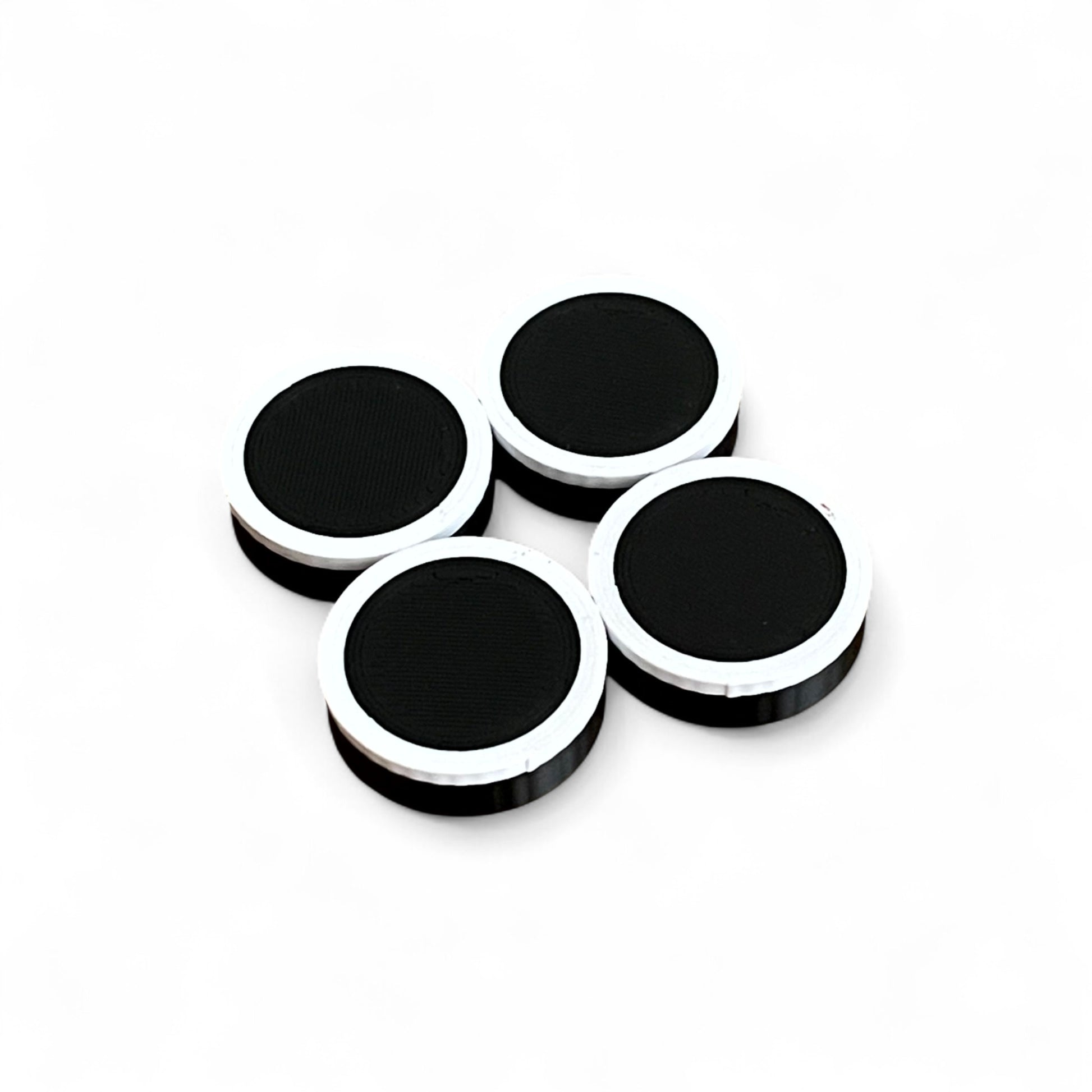 Set of 4 Guitar Pedal Footswitch Topper Low Profile for 11MM Foot Switch. 3D printed Black Base and White Ring Design by Cold Earth Industries, shown on a white background.