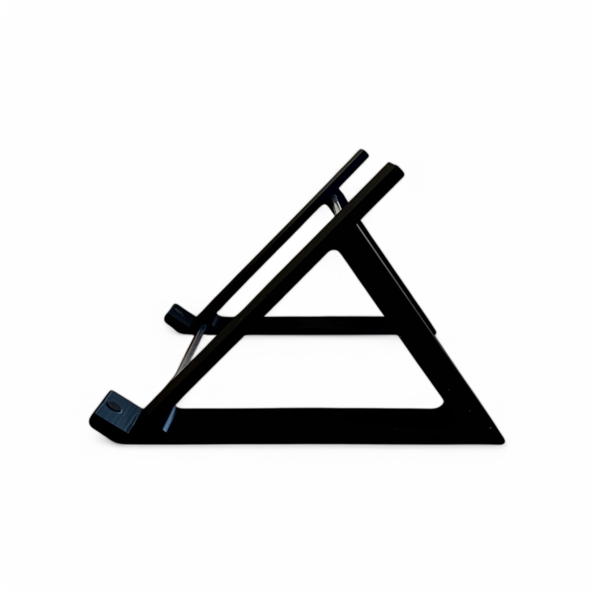 Reverse side view of a black desktop stand from Cold Earth Industries designed for the Roland SH-4d Digital Desktop Synthesizer, featuring a robust PLA+ & aluminum structure at a 45 degree angle.