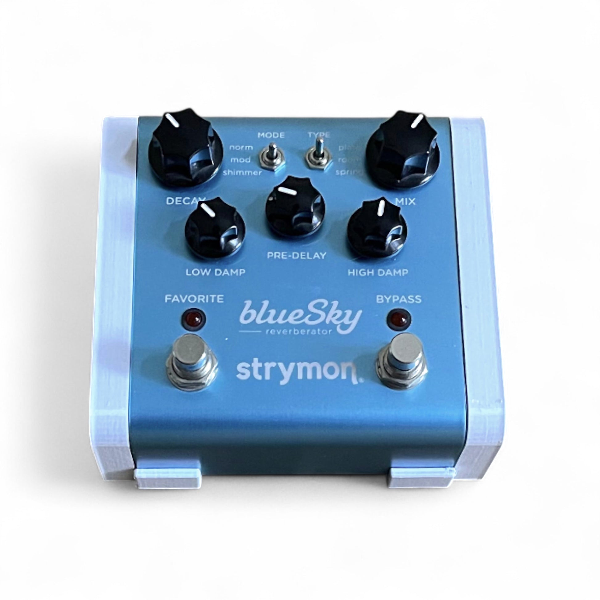 3D printed Strymon Strymon Pedal Stand Guitar Pedal 30 Degree stand by Cold Earth Industries, shown front view in white on a white background with Strymon blueSky guitar pedal